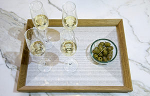 Situation of the oak service tray designed by Alix Welter. Alix Welter's Crystal I print collection